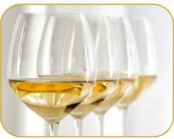Red wine pouring from bottle - White wine in glasses